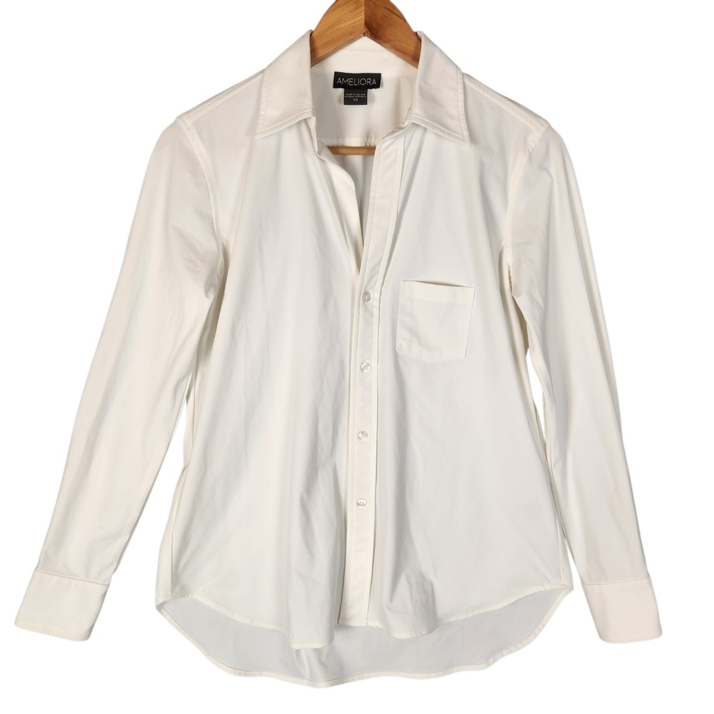 AMELIORA Button Down Shirt XS White Long Sleeve Stretch High-Low Hem Pocket Dawn